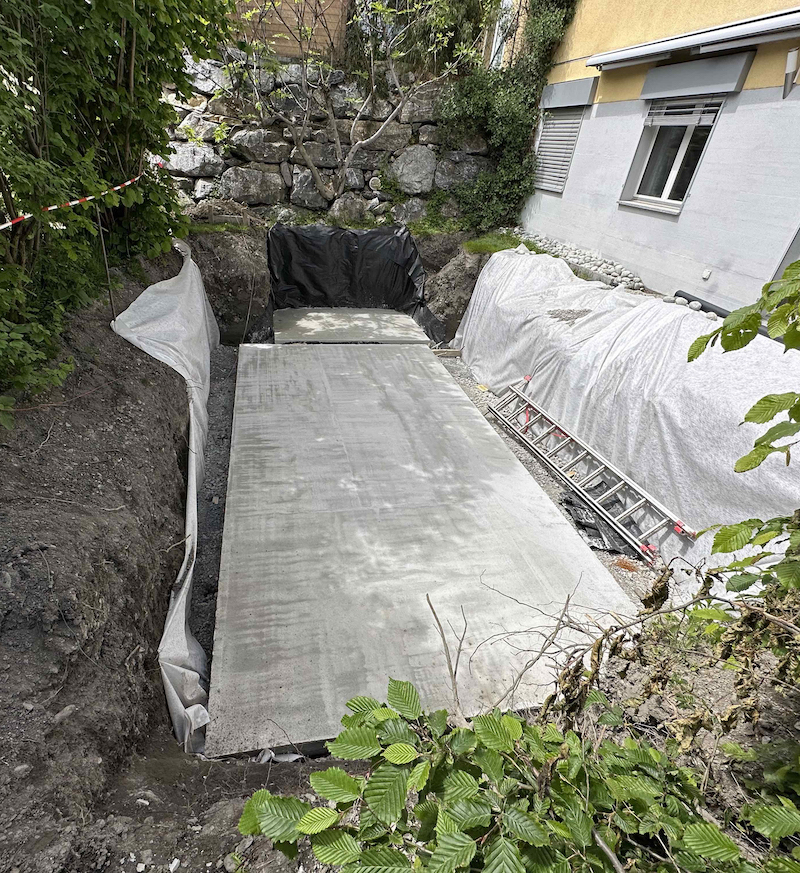 Construction piscine dalle de béton